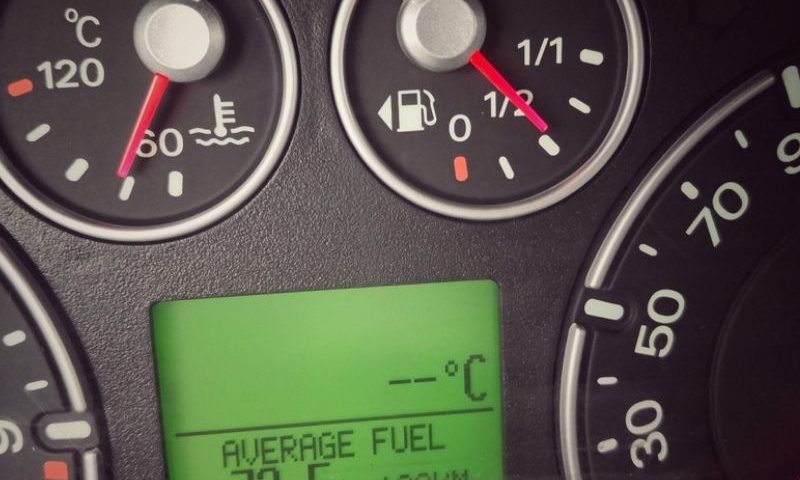 close up of a car's digital display, showing a very high fuel consumption